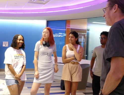 Students at a standup meeting